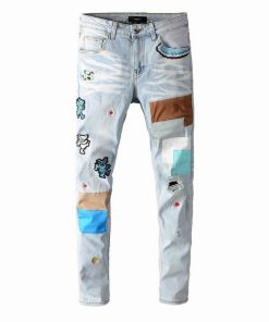 AMIRI RIPPED JEANS EMBROIDED