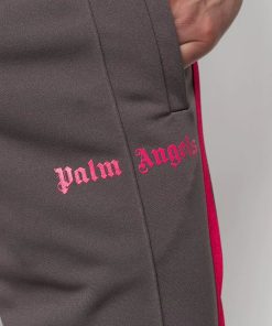 PALM ANGELS LOGO PRINT TRACK PANTS. Vertical stripes