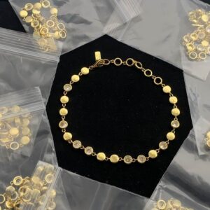 Gold-Tone Station Bracelet Alternating Solid Discs & Bezel-Set Crystals