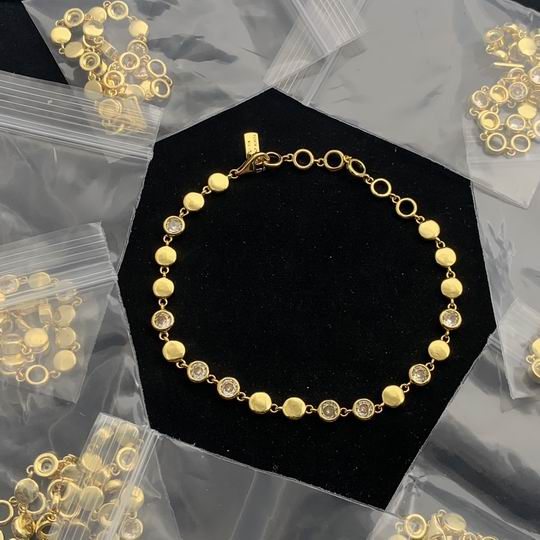 Gold-Tone Station Bracelet Alternating Solid Discs & Bezel-Set Crystals